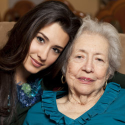 caregiver hugging patient